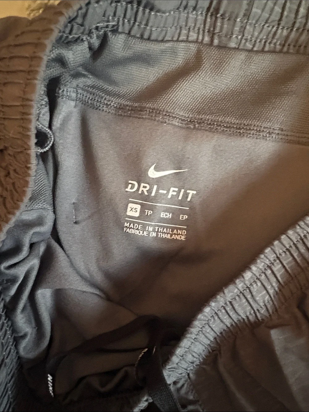 Nike Gray Athletic Shorts with Light Pink Swoosh